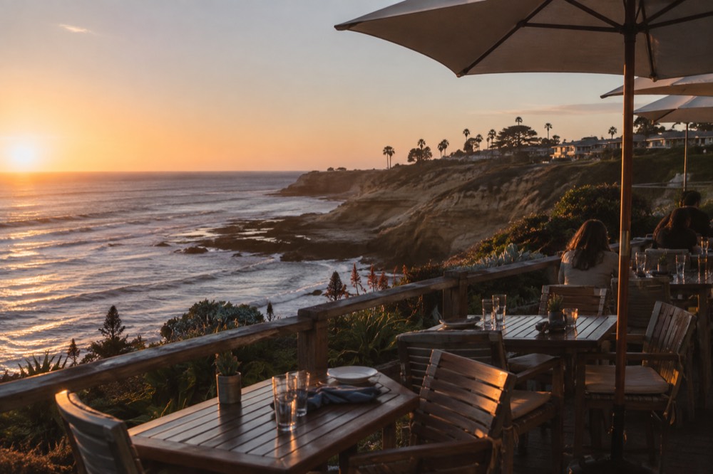 Coastal restaurant terrace overlooking the ocean near La Jolla at golden hour
