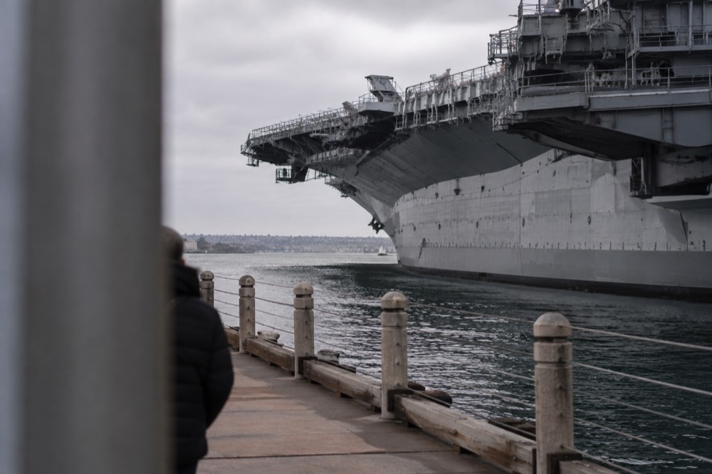 Historic aircraft carrier museum ship moored along the downtown San Diego waterfront