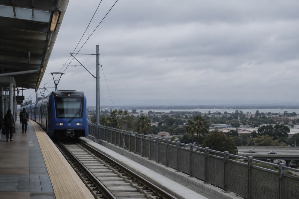 Blue Line trolley arriving at an elevated station in the South Bay