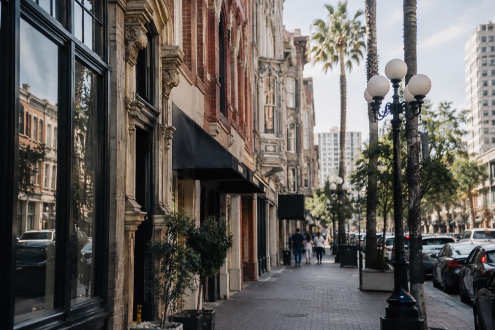 Historic ornate building facades along a Gaslamp Quarter street in daylight