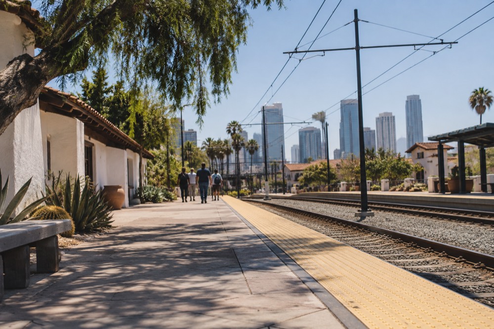 Trolley platform with the San Diego skyline visible in the distance