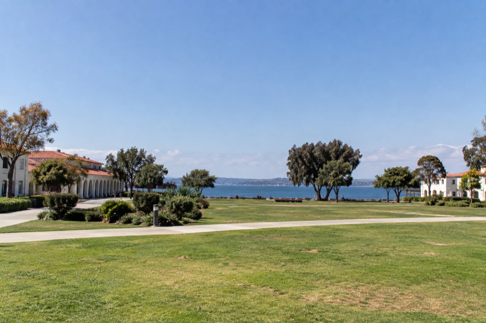Waterfront lawns and historic buildings at Liberty Station in Point Loma