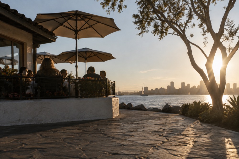 Restaurant patio with umbrellas overlooking the bay