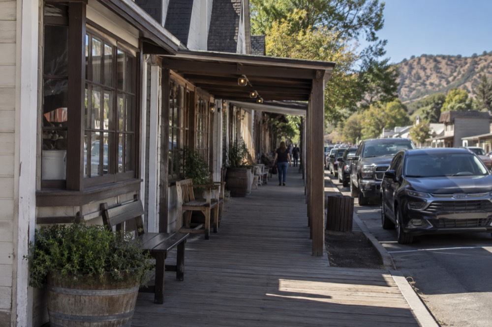 Historic wooden storefronts along a small town main street