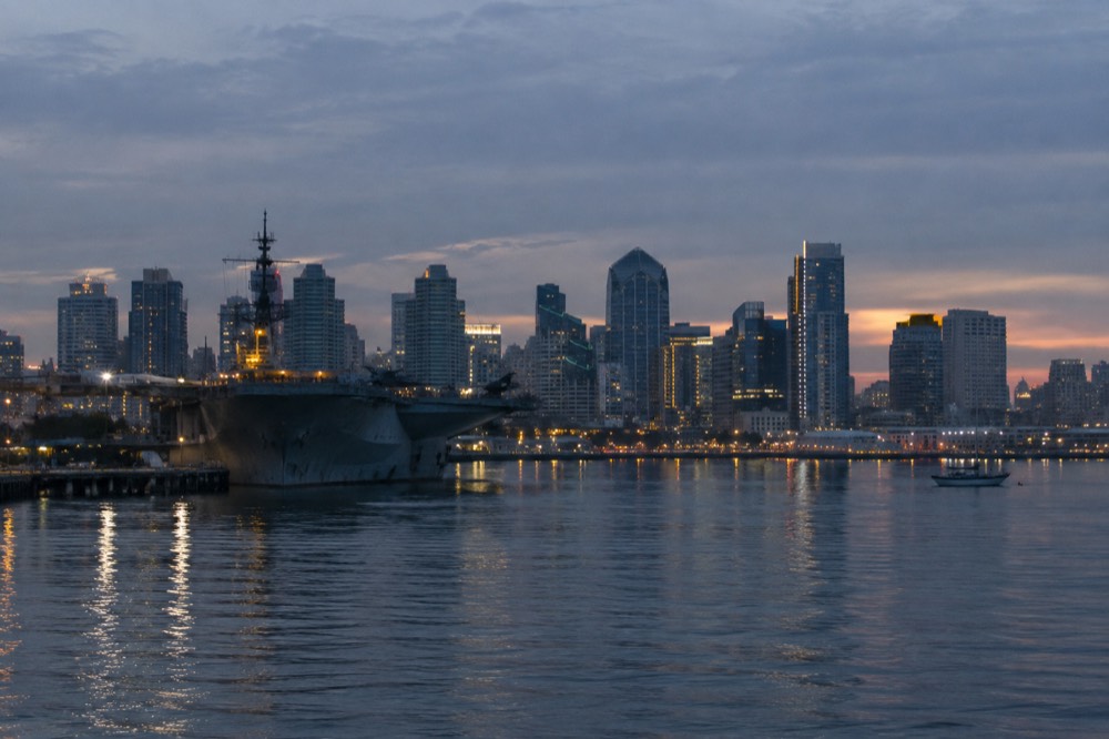 Downtown San Diego skyline across the bay with a museum ship in the foreground