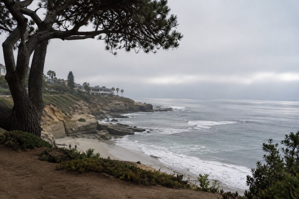 Morning marine layer clearing over a La Jolla coastline
