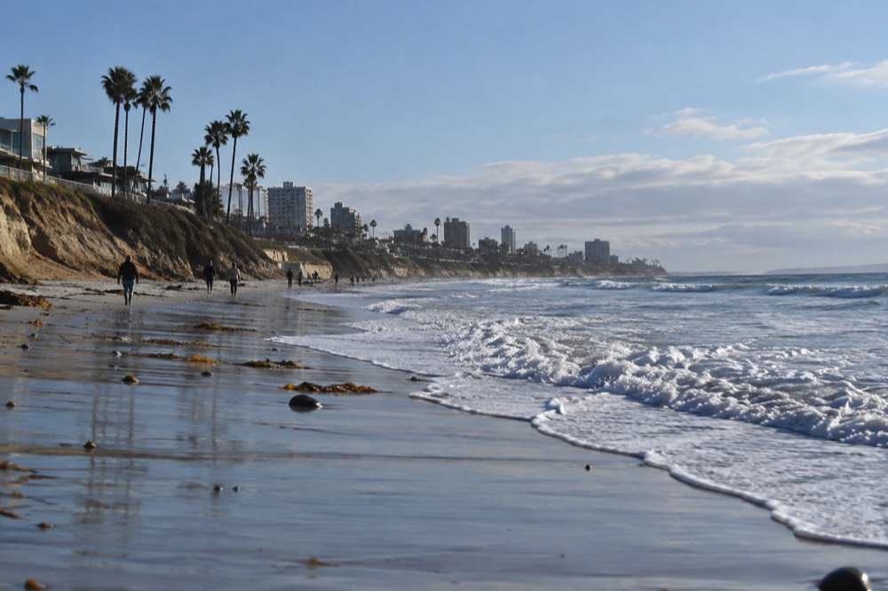 A quiet San Diego beach with soft winter light over the Pacific Ocean