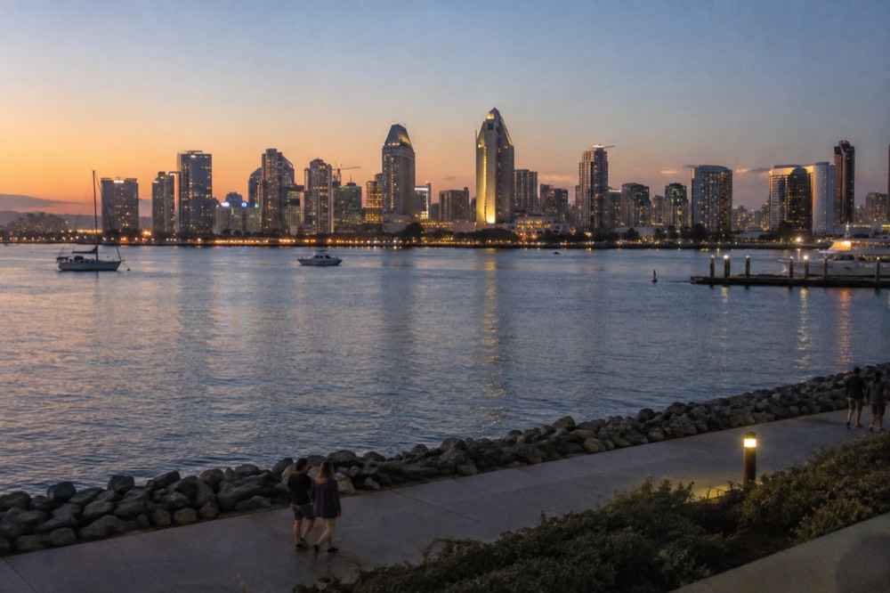 Evening skyline of downtown San Diego across the bay at dusk