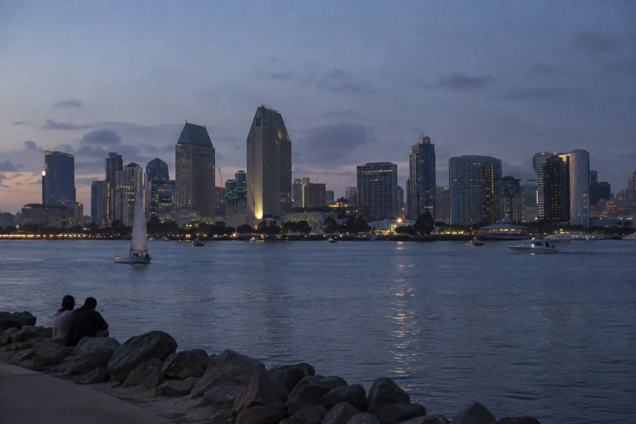 View over San Diego Bay with the downtown skyline and a Navy ship at the waterfront