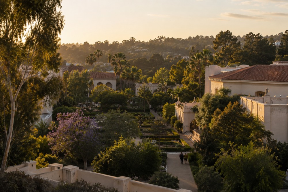 View over Balboa Park gardens and museum buildings toward the San Zoo area