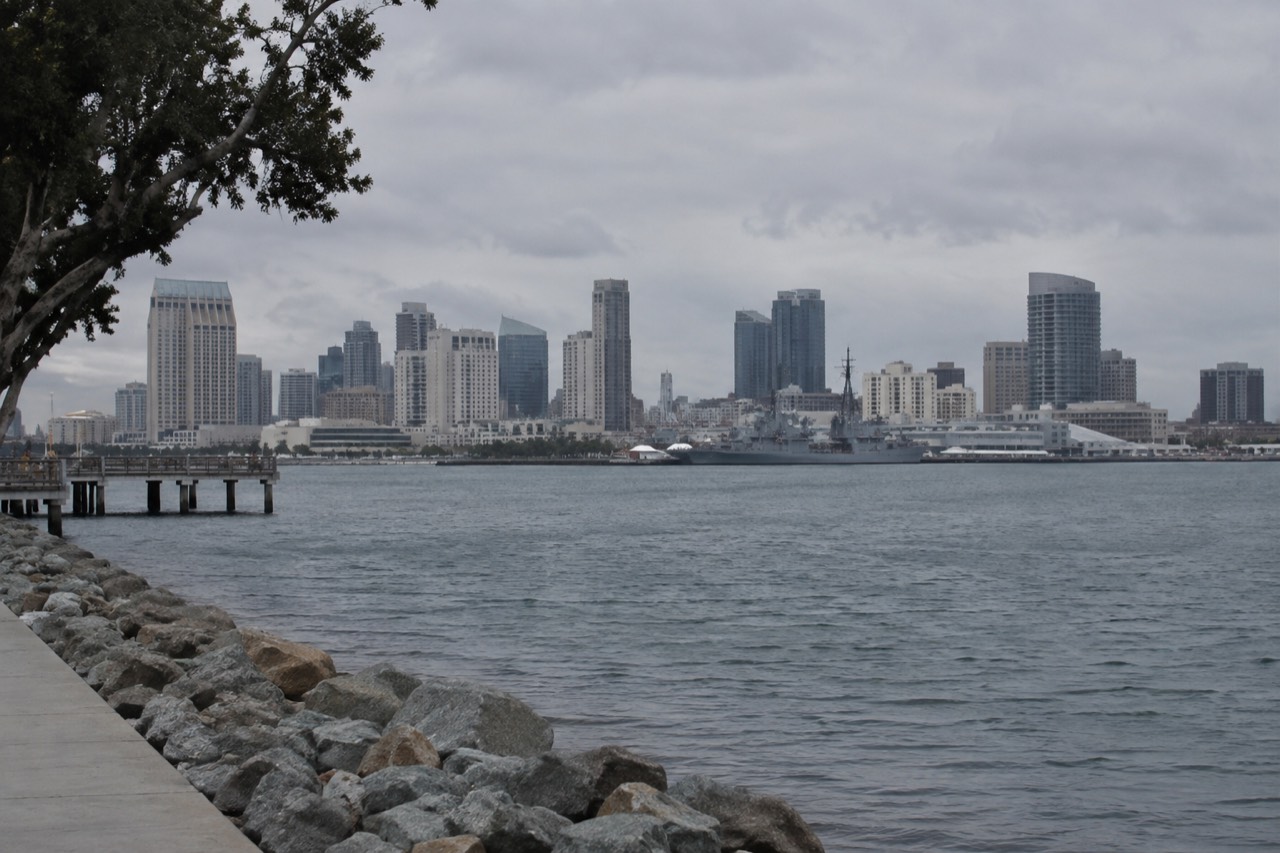 View over San Diego Bay with the downtown skyline and a museum ship at the waterfront